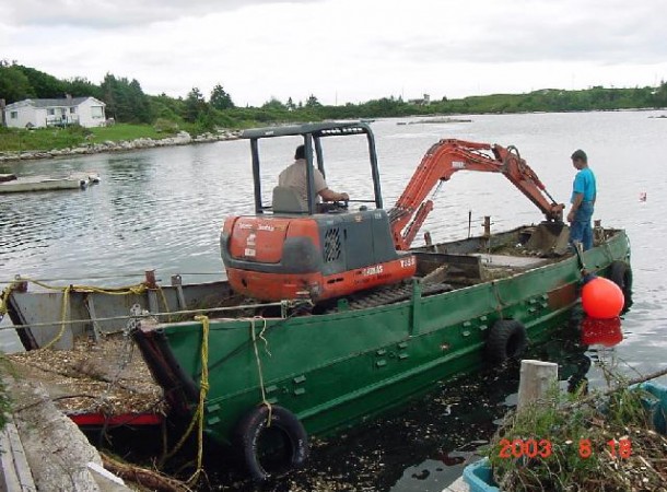 <span>Loading mini:</span> Loading mini excavator for trip to the island